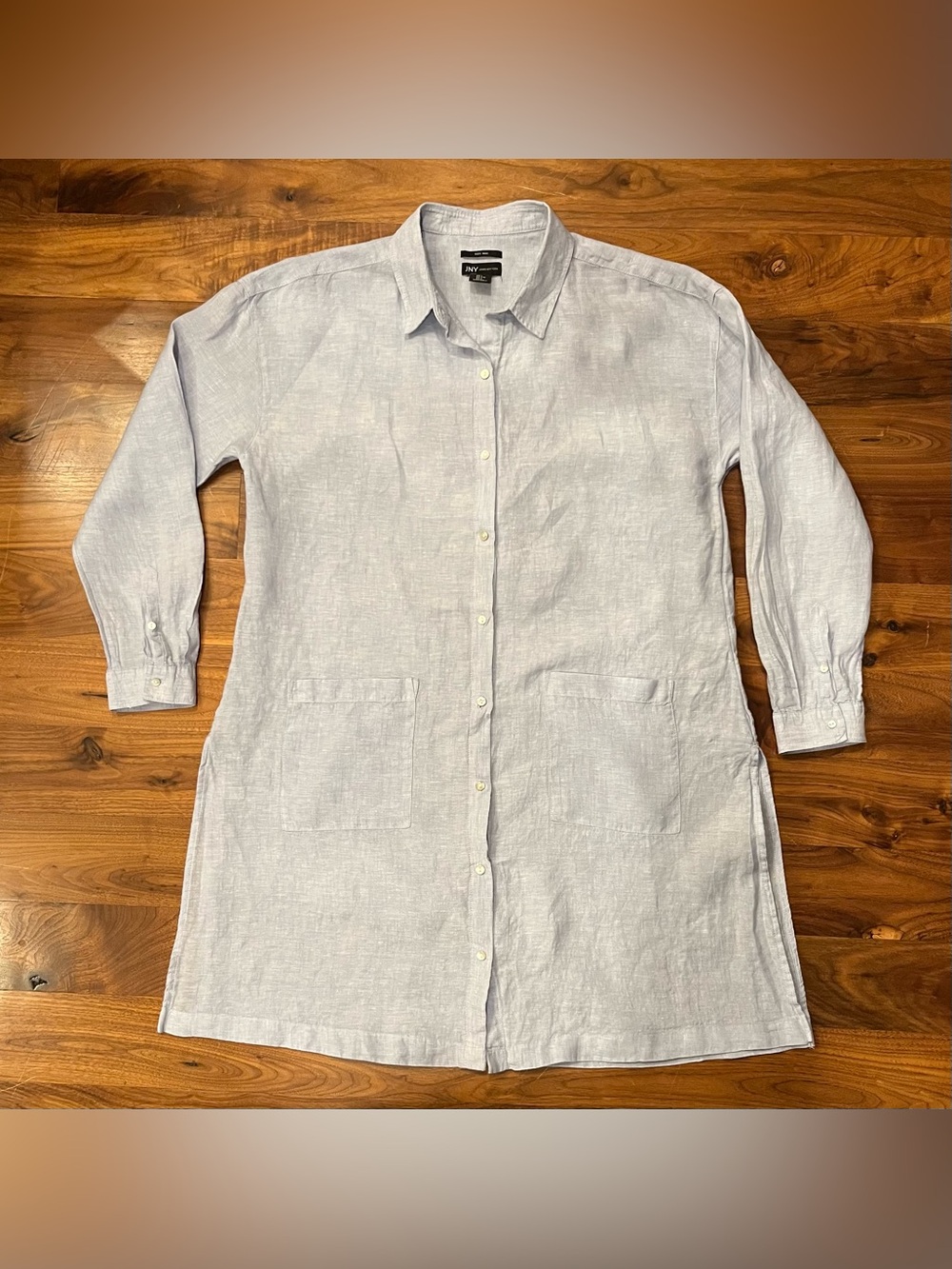 Light blue button-front linen tunic dress by the brand Jones New York.
